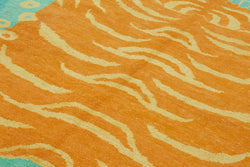 Collection of 7' 3'' x 10' 2'' Handmade Tiger Rug in a gallery layout