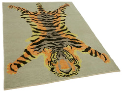 Collection of 4' 8'' x 6' 2'' Handmade Tiger Rug in a gallery layout