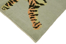 Collection of 4' 8'' x 6' 2'' Handmade Tiger Rug in a gallery layout