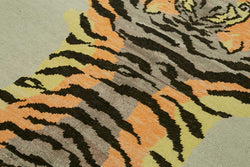 Collection of 4' 8'' x 6' 2'' Handmade Tiger Rug in a gallery layout