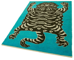 Collection of 4' 1'' x 6' Handmade Tiger Rug in a gallery layout