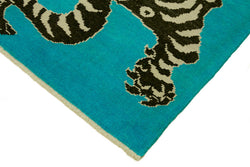 Collection of 4' 1'' x 6' Handmade Tiger Rug in a gallery layout