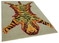 Collection of 5' 6'' x 7' 7'' Handmade Tiger Rug in a gallery layout