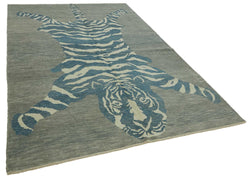 Collection of 6' 11'' x 10' 6'' Handmade Tiger Rug in a gallery layout