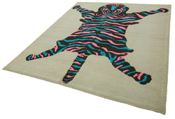 Collection of 8' 3'' x 10' 2'' Handmade Tiger Rug in a gallery layout