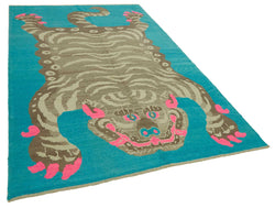 Collection of 6' 11'' x 10' 4'' Handmade Tiger Rug in a gallery layout