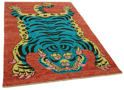 Collection of 4' 9'' x 7' Handmade Tiger Rug in a gallery layout