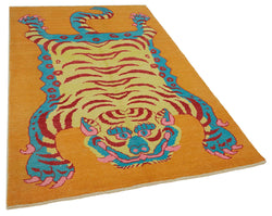 Collection of 5' 1'' x 8' 1'' Handmade Tiger Rug in a gallery layout