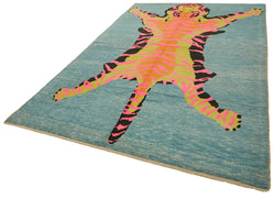 Collection of 7' 1'' x 11' 2'' Handmade Tiger Rug in a gallery layout