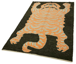 Collection of 4' 3'' x 6' 10'' Handmade Tiger Rug in a gallery layout