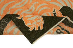 Collection of 4' 3'' x 6' 10'' Handmade Tiger Rug in a gallery layout