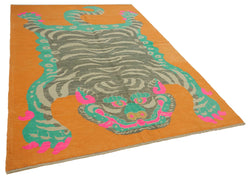 Collection of 6' 11'' x 10' 6'' Handmade Tiger Rug in a gallery layout