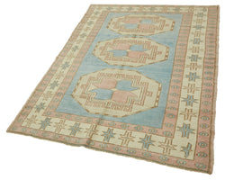 Collection of 4' 10'' x 7' 6'' Handmade Anatolian Rug in a gallery layout