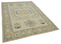 Collection of 6' 11'' x 9' 4'' Handmade Anatolian Rug in a gallery layout